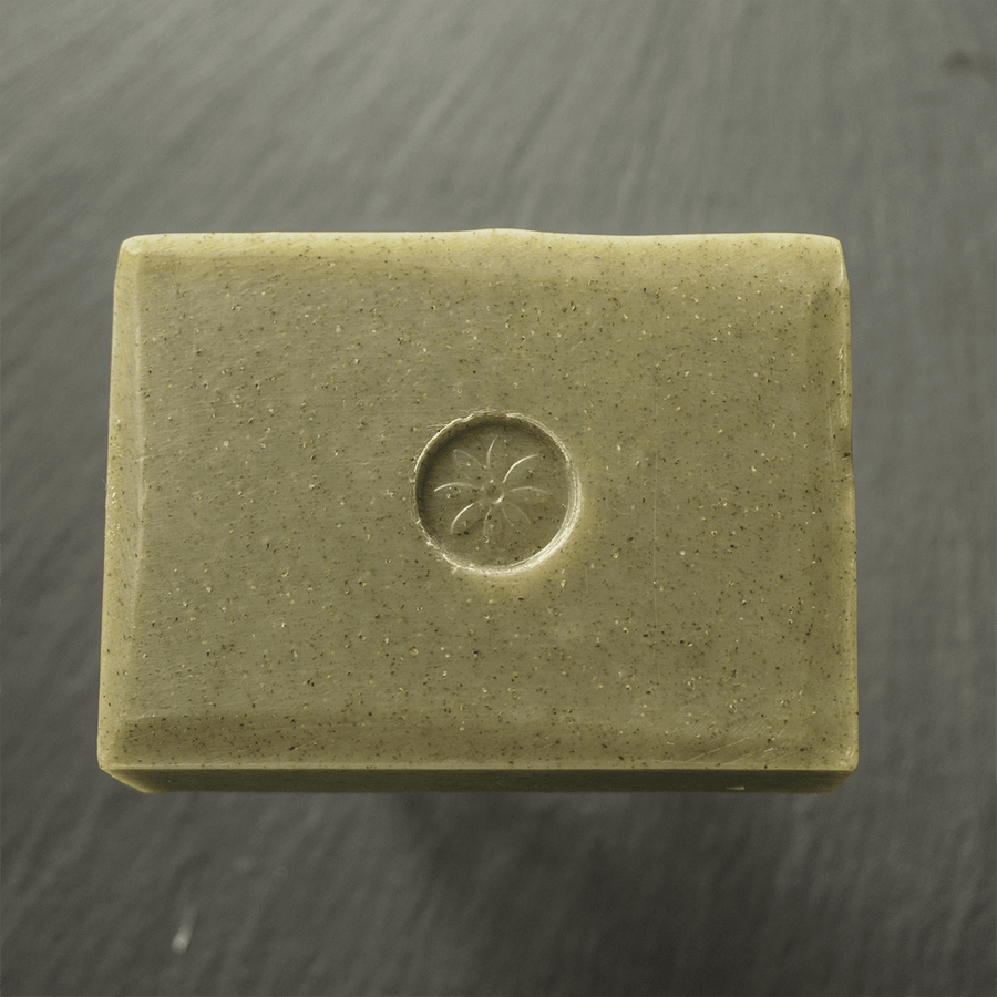 Mint Bar Soap by TONIC, unwrapped on a slate background
