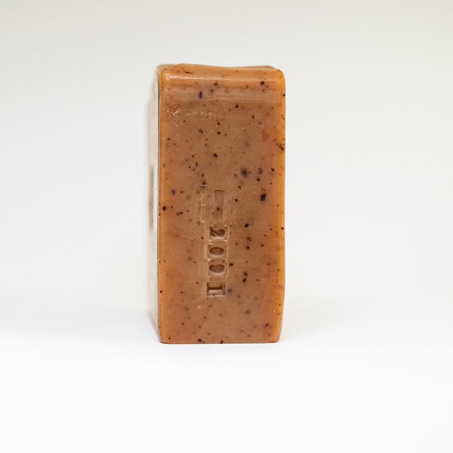 side view of the batch stamp on an unwrapped bar of Matcha Green Tea bar soap