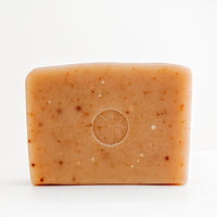 Honey Lavender Bar Soap by TONIC unwrapped on a white background