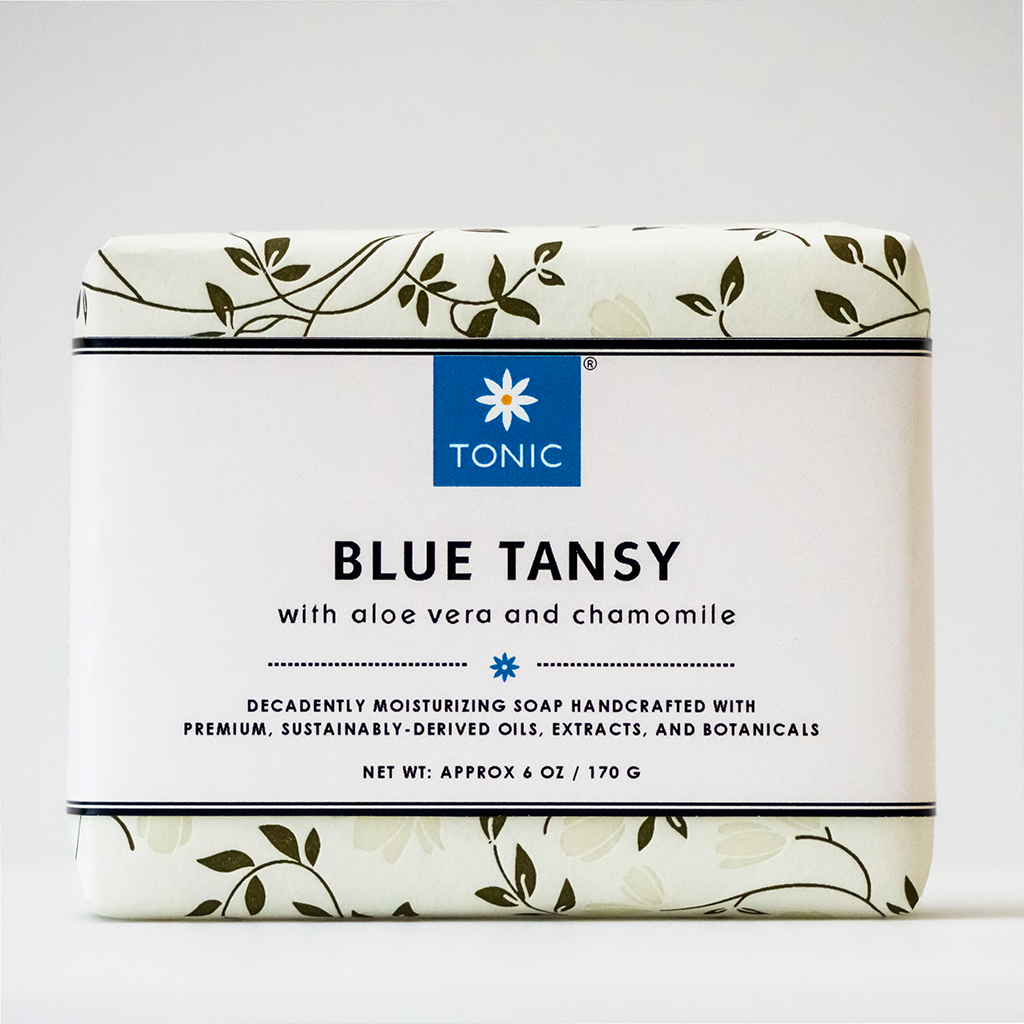 Blue Tansy Bar Soap with Aloe Vera and Chamomile for face and sensitive skin. Wrapped and on a white background.