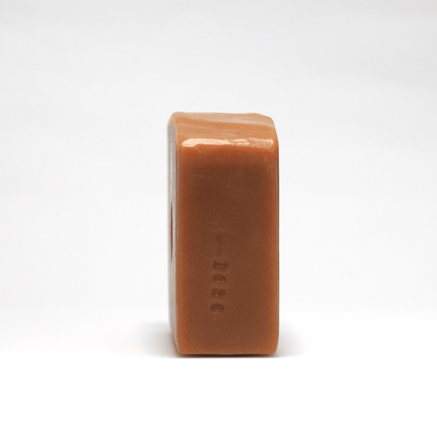 Chamomile Carrot Bar Soap with Passionfruit, Turmeric, and Honey with batch stamp
