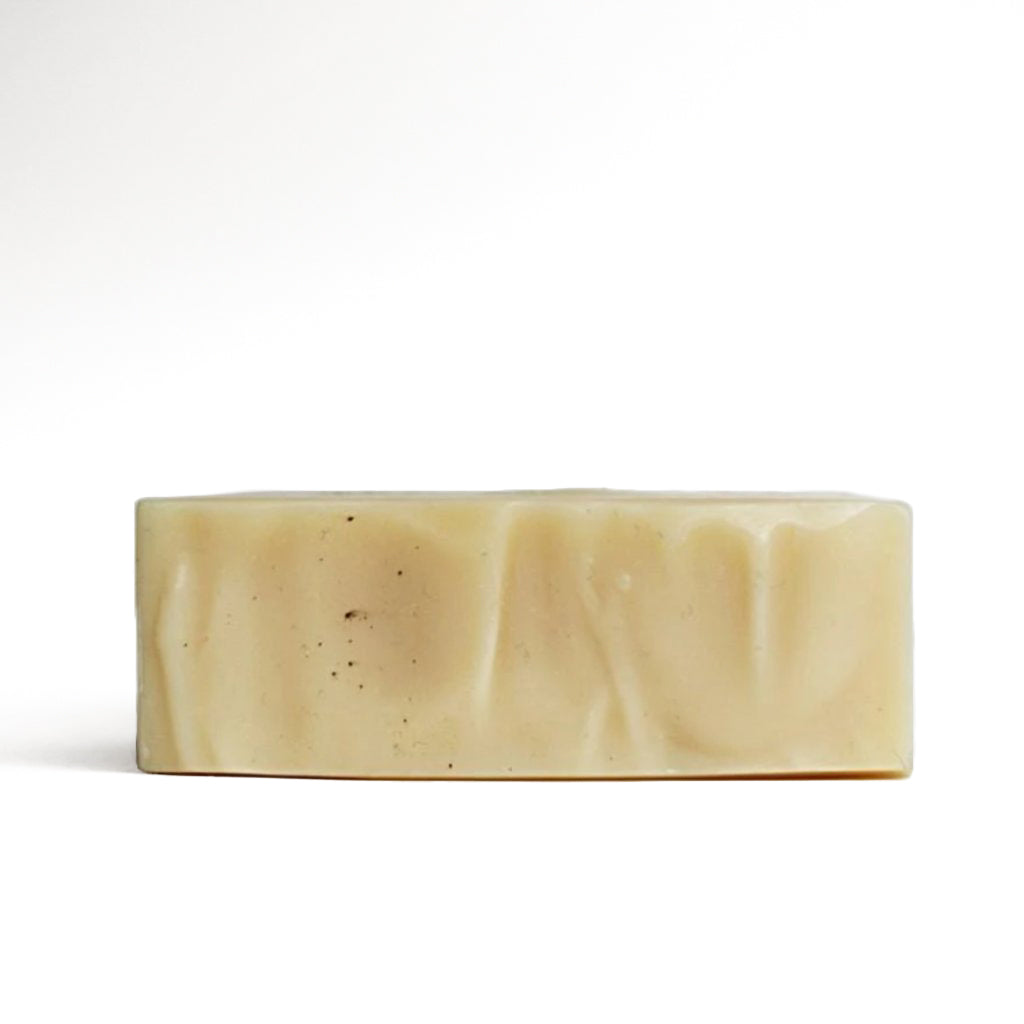 The unwrapped top view of eucalyptus bar soap by TONIC