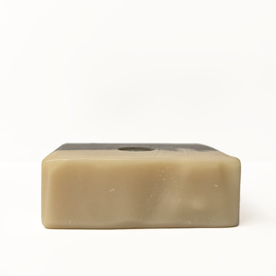 The unwrapped top view of eucalyptus bar soap by TONIC