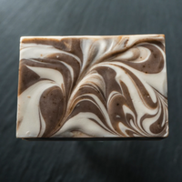 Unwrapped Lavender Cream Bar Soap on dark slate | TONIC