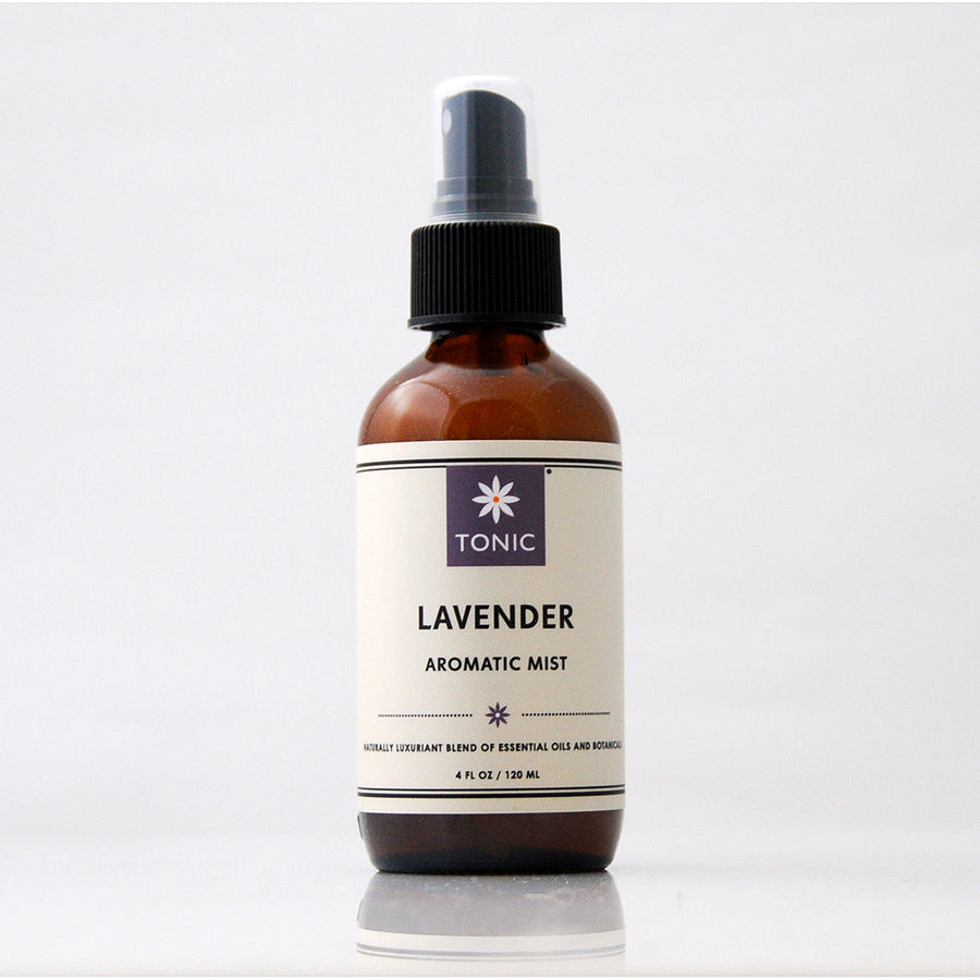 TONIC Lavender Aromatic Mist Room Spray in an amber glass bottle against a light grey background