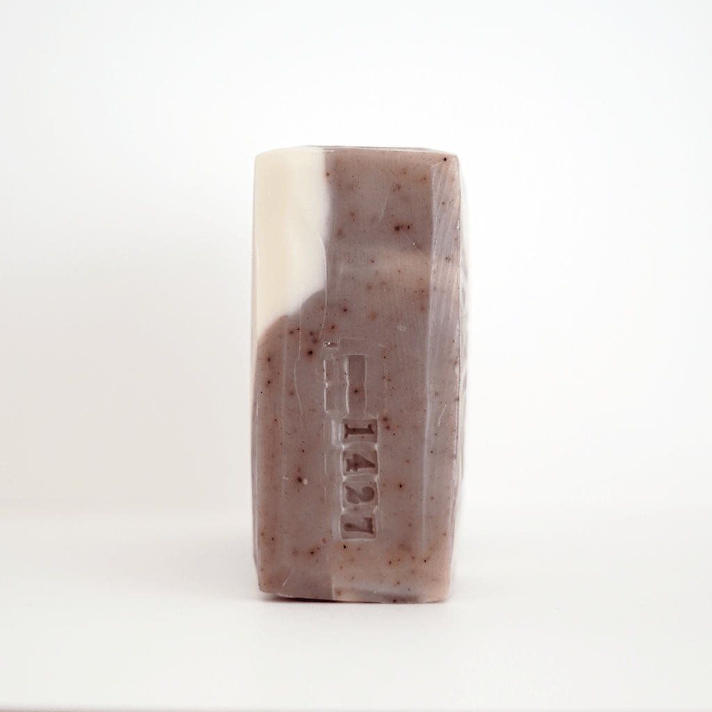 Side View of Unwrapped Lavender Cream Bar Soap | TONIC