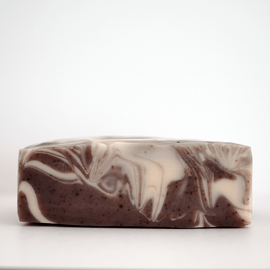 Top View of Unwrapped Lavender Cream Bar Soap with Stamp | TONIC