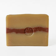 Rockrose Bar Soap, unwrapped and displaying TONIC's logo stamp