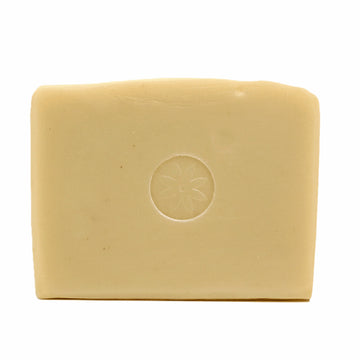 Tonic Naturals Tiare Gardenia Absolute Bar Soap unwrapped on an off white background